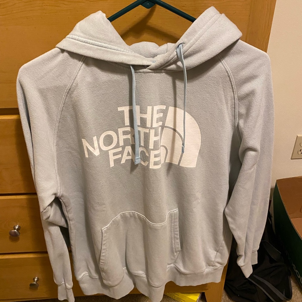 Woman’s The North Face hooded sweatshirt